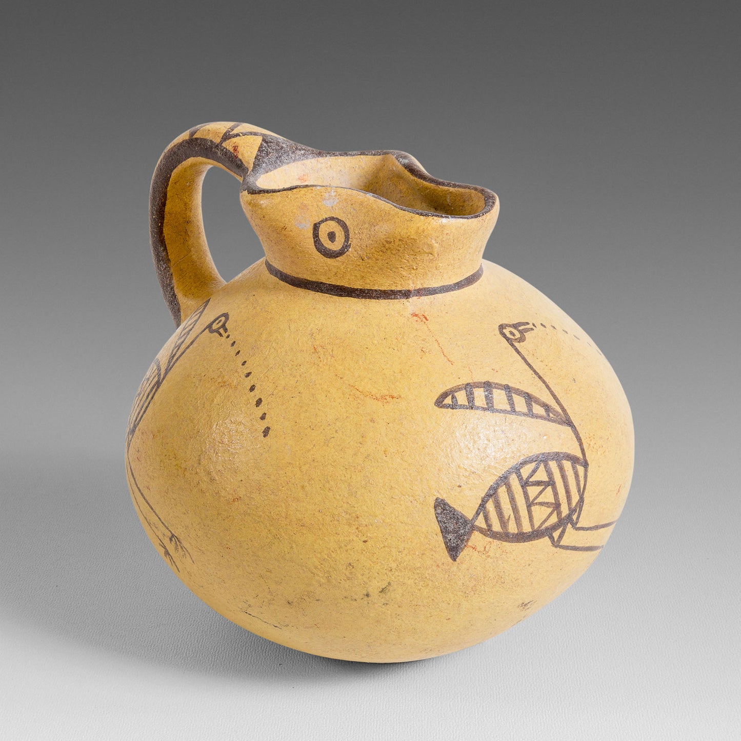 Small bird-decorated jug