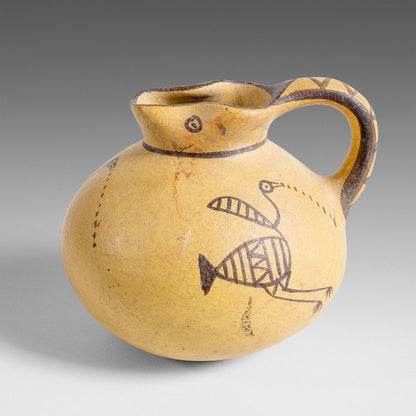 Small bird-decorated jug