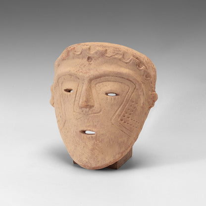 Malagana incised mask