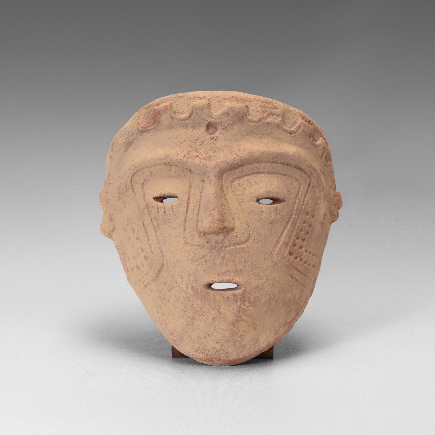 Malagana incised mask