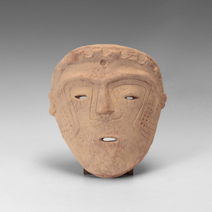 Malagana incised mask