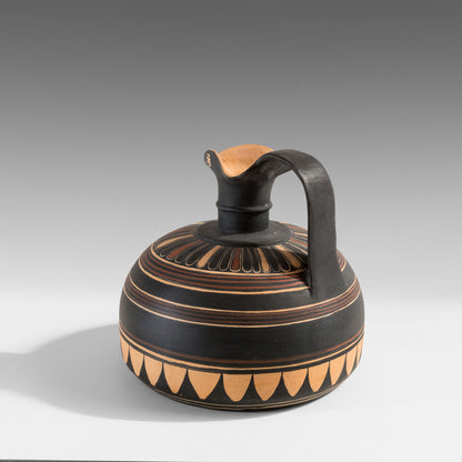 Corinthian Œnochoe with a flat base