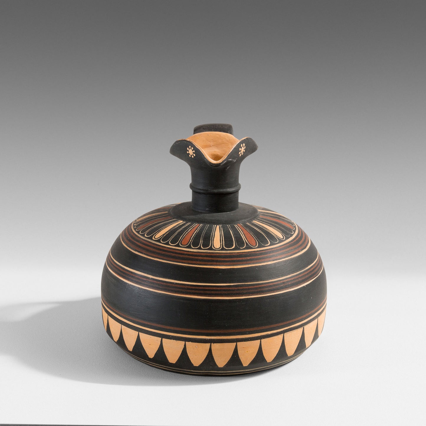 Corinthian Œnochoe with a flat base