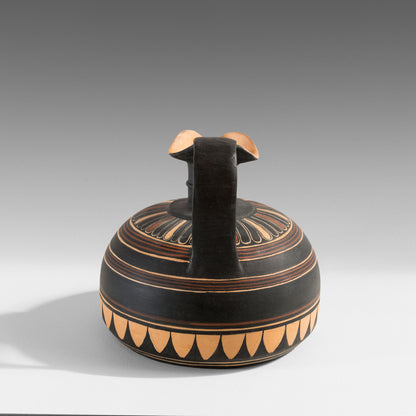 Corinthian Œnochoe with a flat base