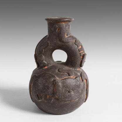 Chavin black jaguars neck-stirrup jar